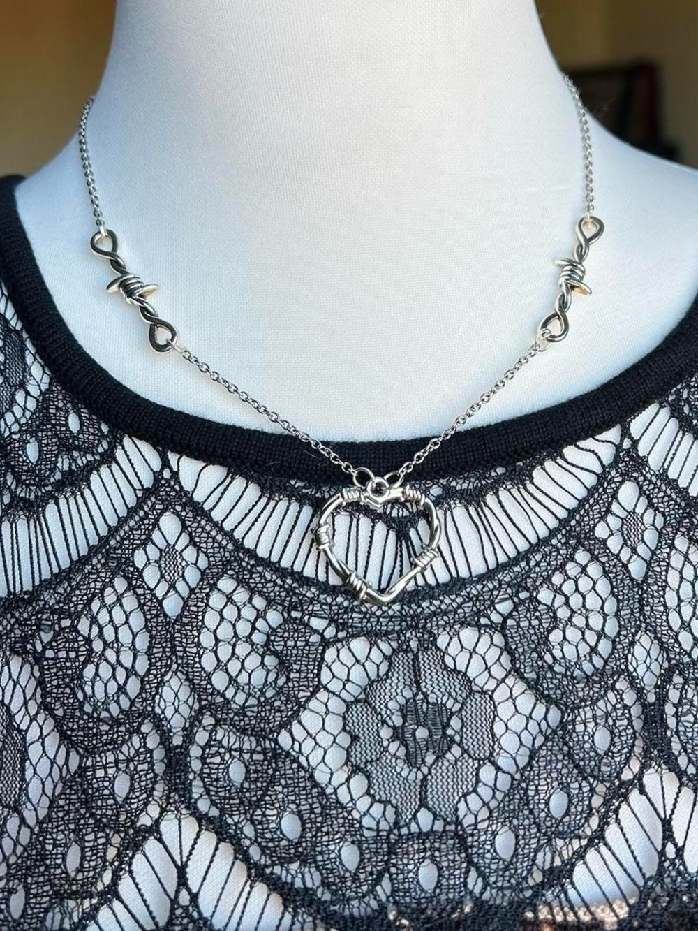 Alt silver heart pendant necklace with barbed wire charms
